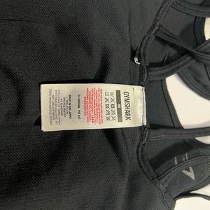 Gymshark Medium, black/hints of dark green sports bra. Took inserts out.